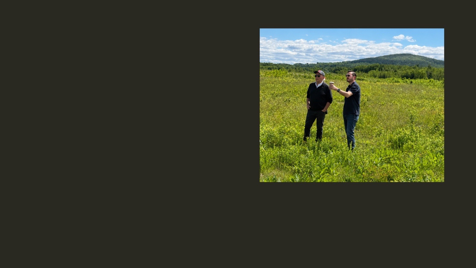 Development milestones and photograph of Doug Beane reviewing the site